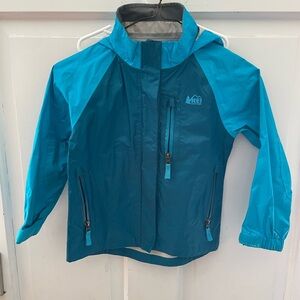 Blue REI Rain Shell Waterproof Jacket with hood